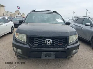 2013 Honda Ridgeline RTL with VIN 5FPYK1F56DB003473, listed as a IAAI auction lot 42101963 with 170,375 mi miles and . Bid and sale history available at DreamBid. Image 12.