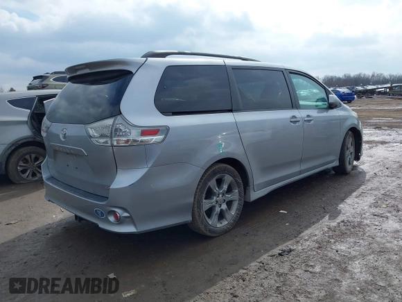 2011 Toyota Sienna SE with VIN 5TDXK3DC1BS096963, listed as a IAAI auction lot 41676328 with 168,436 mi miles. Bid and sale history available at carsss.com. Image 4.