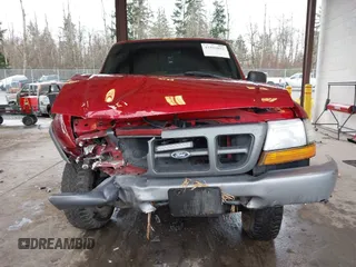1999 Ford Ranger XL with VIN 1FTZR15VXXPB34362, listed as a IAAI auction lot 41592852 with 247,015 mi miles. Bid and sale history available at carsss.com. Image 12.