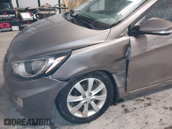 2013 Hyundai Accent SE with VIN KMHCU5AE6DU097353, listed as a IAAI auction lot 41937225 with 173,447 mi miles. Bid and sale history available at carsss.com. Image 6.