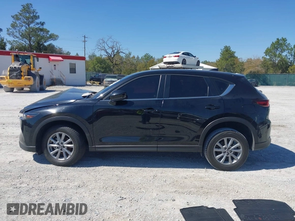 2023 Mazda CX-5 2.5 S with VIN JM3KFBAM3P0244974, listed as a IAAI auction lot 41748896 with 21,387 mi miles. Bid and sale history available at carsss.com. Image 14.