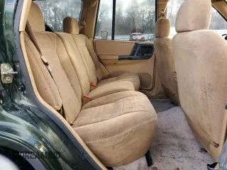 1996 Jeep Grand Cherokee with VIN 1J4EZ58S9TC148692, listed as a Copart auction lot 87730075 with Not provided miles and Salvage title. Bid and sale history available at DreamBid. Image 11.