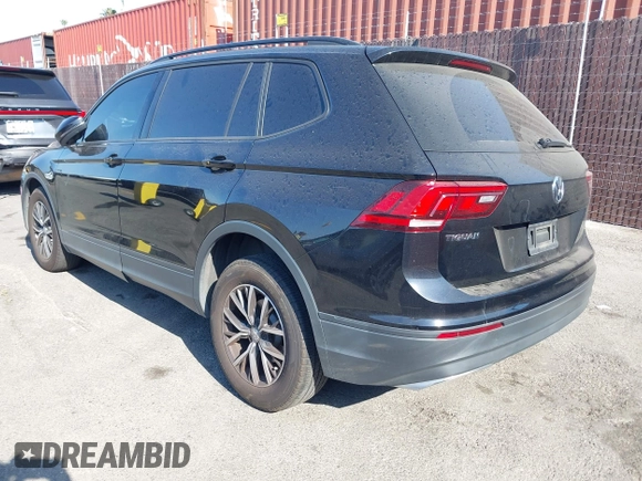 2021 Volkswagen Tiguan S with VIN 3VV1B7AX2MM142289, listed as a IAAI auction lot 42403346 with 71,182 mi miles and . Bid and sale history available at DreamBid. Image 3.