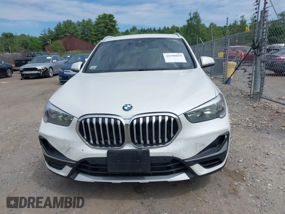 2021 BMW X1 xDrive28i with VIN WBXJG9C07M5U21337, listed as a IAAI auction lot 42590859 with 35,934 mi miles and . Bid and sale history available at DreamBid. Image 12.