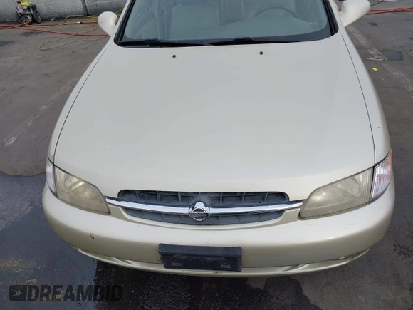 1998 Nissan Altima XE with VIN 1N4DL01D9WC110391, listed as a IAAI auction lot 41085735 with 100,322 mi miles. Bid and sale history available at carsss.com. Image 6.
