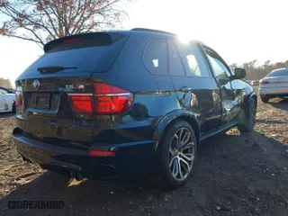 2013 BMW X5 M with VIN 5YMGY0C55DLL15645, listed as a IAAI auction lot 40809601 with 67,956 mi miles. Bid and sale history available at carsss.com. Image 4.