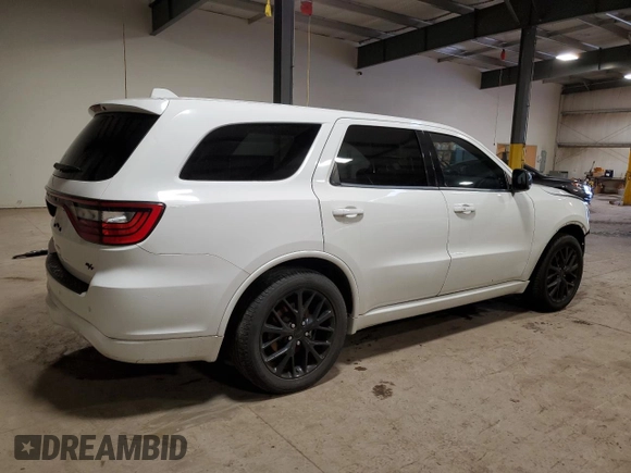 2015 Dodge Durango R/T with VIN 1C4SDHCTXFC916712, listed as a Copart auction lot 87113784 with 120,950 mi miles and Salvage Title. Bid and sale history available at DreamBid. Image 3.