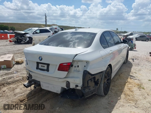 2016 BMW 5 Series 528i xDrive with VIN WBA5A7C59GG146169, listed as a IAAI auction lot 41941330 with 49,732 mi miles. Bid and sale history available at carsss.com. Image 4.