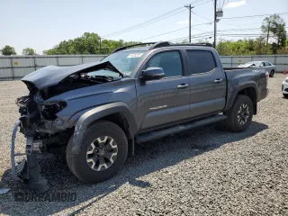 2023 Toyota Tacoma SR with VIN 3TYCZ5AN4PT163580, listed as a Copart auction lot 61533295 with 56,953 mi miles and Salvage title. Bid and sale history available at DreamBid. Image 1.