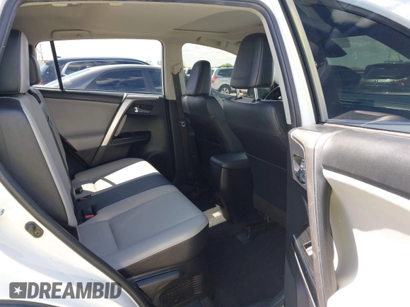 2017 Toyota RAV4 Hybrid Limited with VIN JTMDJREV4HD110724, listed as a IAAI auction lot 42141585 with 80,671 mi miles. Bid and sale history available at carsss.com. Image 8.