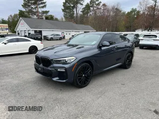 2021 BMW X6 sDrive40i z VIN 5UXCY4C05M9H19479, wystawiony jako Copart lot #54268205 z przebiegiem 85 899 mil mil oraz Czysty tytuł • Clean title. Historia ofert i sprzedaży dostępna na DreamBid. Obrazek 2.