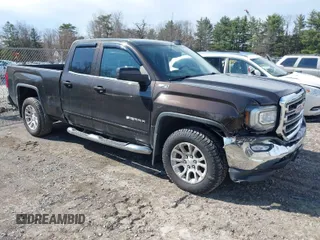 2018 GMC Sierra 1500 SLE z VIN 1GTV2MEC3JZ143967, wystawiony jako IAAI lot #41853850 z przebiegiem 80 205 mil mil oraz . Historia ofert i sprzedaży dostępna na DreamBid. Obrazek 1.