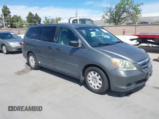 2007 Honda Odyssey LX with VIN 5FNRL38267B006645, listed as a IAAI auction lot 42019158 with 132,897 mi miles. Bid and sale history available at carsss.com. Image 1.