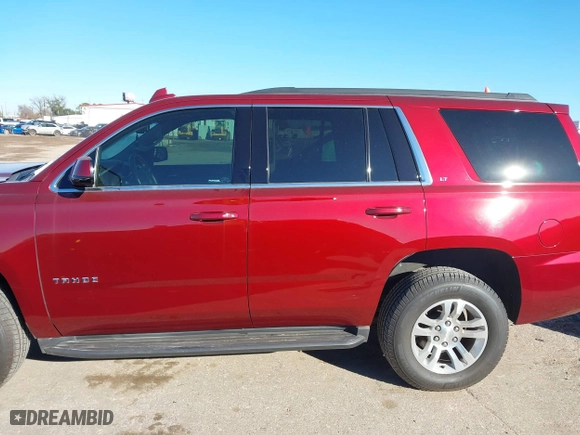 2019 Chevrolet Tahoe LT with VIN 1GNSKBKC3KR377093, listed as a IAAI auction lot 41300728 with 76,023 mi miles. Bid and sale history available at carsss.com. Image 14.