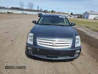 2007 Cadillac STS z VIN 1G6DW677970160672, wystawiony jako Copart lot #50568525 z przebiegiem 127 699 mil mil oraz Szkody całkowita. Historia ofert i sprzedaży dostępna na DreamBid. Obrazek 5.