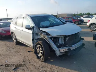2020 Honda Pilot Elite with VIN 5FNYF6H05LB028181, listed as a IAAI auction lot 42351415 with 78,437 mi miles and . Bid and sale history available at DreamBid. Image 1.