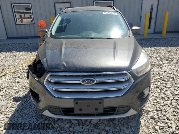 2018 Ford Escape SE z VIN 1FMCU9GD0JUA95941, wystawiony jako Copart lot #56606625 z przebiegiem 137 924 mil mil oraz Nie do naprawy • Non repairable. Historia ofert i sprzedaży dostępna na DreamBid. Obrazek 5.