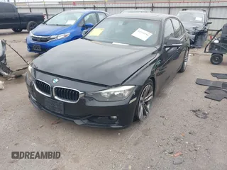 2013 BMW 3 Series 328i with VIN WBA3C1C58DF441909, listed as a IAAI auction lot 41915194 with 161,689 mi miles and . Bid and sale history available at carsss.com. Image 2.
