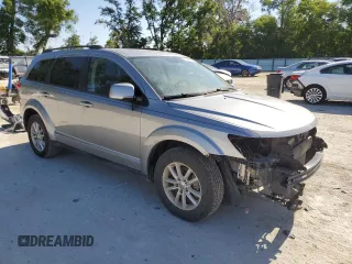 2017 Dodge Journey SXT with VIN 3C4PDCBG2HT521671, listed as a Copart auction lot 52565935 with 116,440 mi miles and Salvage Title. Bid and sale history available at DreamBid. Image 4.