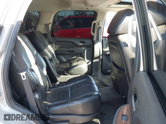2007 GMC Yukon SLE with VIN 1GKFK130X7J131757, listed as a IAAI auction lot 41237779 with 156,148 mi miles. Bid and sale history available at carsss.com. Image 8.