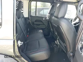 2025 Jeep Wrangler Rubicon with VIN 1C4PJXFNXSW532895, listed as a IAAI auction lot 42694548 with 1,886 mi miles and . Bid and sale history available at DreamBid. Image 8.