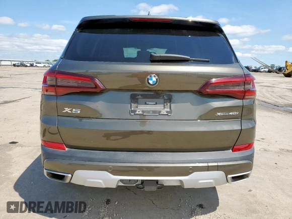 2023 BMW X5 xDrive40i with VIN 5UXCR6C01P9P27041, listed as a Copart auction lot 59009585 with 45,568 mi miles and Salvage title. Bid and sale history available at DreamBid. Image 6.