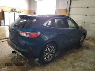 2020 Ford Escape Titanium Hybrid z VIN 1FMCU9DZ0LUA74302, wystawiony jako Copart lot #48614065 z przebiegiem 91 923 mil mil oraz Szkoda całkowita • Salvage title. Historia ofert i sprzedaży dostępna na DreamBid. Obrazek 3.
