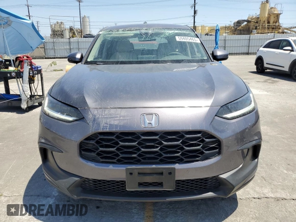 2023 Honda HR-V LX with VIN 3CZRZ1H34PM729931, listed as a Copart auction lot 59405465 with 24,375 mi miles and Salvage title. Bid and sale history available at DreamBid. Image 5.