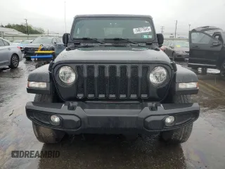 2022 Jeep Wrangler Unlimited Sahara with VIN 1C4HJXEGXNW211886, listed as a Copart auction lot 54877645 with 64,815 mi miles and Salvage title. Bid and sale history available at DreamBid. Image 5.