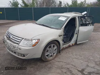 2008 Ford Taurus Limited with VIN 1FAHP25W18G121135, listed as a IAAI auction lot 36254053 with 51,000 mi miles. Bid and sale history available at carsss.com. Image 2.
