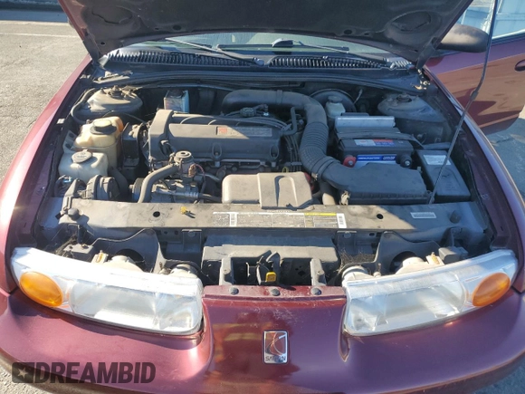 2001 Saturn SL z VIN 1G8ZK54731Z305098, wystawiony jako Copart lot #83875424 z przebiegiem 82 879 mil mil oraz Tytuł czysty. Historia ofert i sprzedaży dostępna na DreamBid. Obrazek 11.