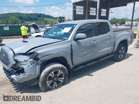 2019 Toyota Tacoma SR with VIN 3TMCZ5AN1KM274625, listed as a IAAI auction lot 42660593 with 163,460 mi miles and . Bid and sale history available at DreamBid. Image 17.