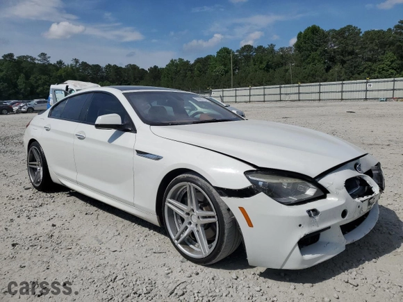 2015 BMW 6 Series 640i with VIN WBA6A0C54FD318040, listed as a Copart auction lot 55583124 with 154,994 mi miles and Salvage Title. Bid and sale history available at carsss.com. Image 4.