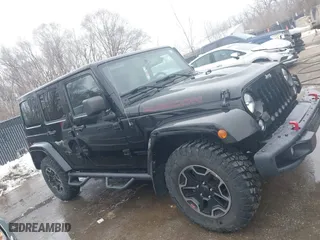 2015 Jeep Wrangler Unlimited Rubicon Hard Rock with VIN 1C4HJWFG9FL569962, listed as a IAAI auction lot 41557801 with 78,597 mi miles. Bid and sale history available at carsss.com. Image 13.