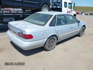 1994 Ford Taurus GL z VIN 1FALP5242RG144553, wystawiony jako IAAI lot #42084759 z przebiegiem 45 059 mil mil oraz . Historia ofert i sprzedaży dostępna na DreamBid. Obrazek 4.