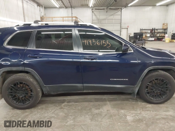 2014 Jeep Cherokee Latitude with VIN 1C4PJMCS9EW190255, listed as a IAAI auction lot 41956155 with 220,265 mi miles. Bid and sale history available at carsss.com. Image 13.