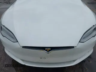 2021 Tesla Model S Long Range Plus with VIN 5YJSA1E21MF425482, listed as a IAAI auction lot 41886030 with Not provided miles and . Bid and sale history available at DreamBid. Image 10.