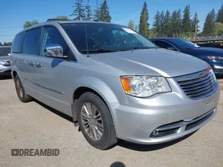 2011 Chrysler Town & Country Limited with VIN 2A4RR6DG4BR667311, listed as a IAAI auction lot 42057487 with 93,628 mi miles. Bid and sale history available at carsss.com. Image 6.