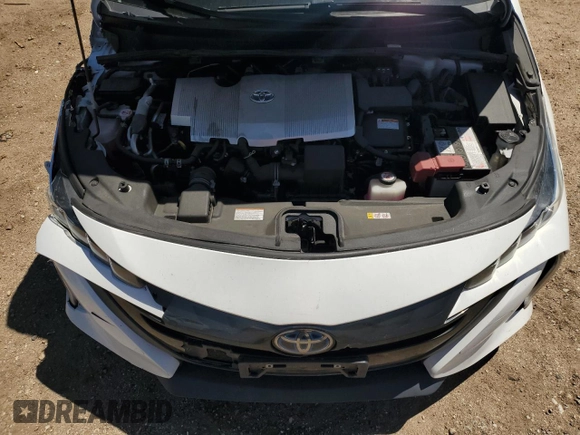 2022 Toyota Prius LE z VIN JTDKAMFP8N3197278, wystawiony jako Copart lot #55828765 z przebiegiem 122 709 mil mil oraz Szkoda całkowita • Salvage title. Historia ofert i sprzedaży dostępna na DreamBid. Obrazek 11.