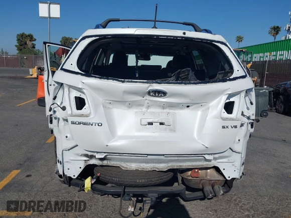 2013 Kia Sorento SX z VIN 5XYKW4A29DG325731, wystawiony jako IAAI lot #42300890 z przebiegiem 62 410 mil mil oraz . Historia ofert i sprzedaży dostępna na DreamBid. Obrazek 6.