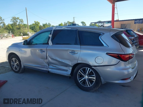 2020 Infiniti QX60 Luxe with VIN 5N1DL0MM2LC503968, listed as a IAAI auction lot 41797974 with 65,128 mi miles and . Bid and sale history available at DreamBid. Image 14.