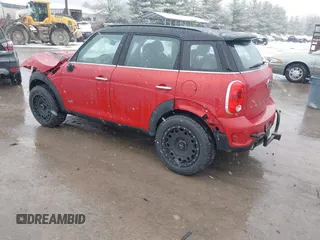 2014 MINI Countryman S z VIN WMWZC5C57EWM17149, wystawiony jako IAAI lot #41246831 z przebiegiem 112 369 mil mil oraz . Historia ofert i sprzedaży dostępna na DreamBid. Obrazek 3.