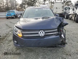 2013 Volkswagen Tiguan S with VIN WVGBV3AX0DW066778, listed as a Copart auction lot 85110984 with 108,027 mi miles and Salvage title. Bid and sale history available at DreamBid. Image 5.