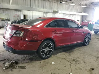 2013 Ford Taurus SHO z VIN 1FAHP2KT8DG157330, wystawiony jako Copart lot #59933015 z przebiegiem 148 865 mil mil oraz Czysty tytuł • Clean title. Historia ofert i sprzedaży dostępna na DreamBid. Obrazek 3.