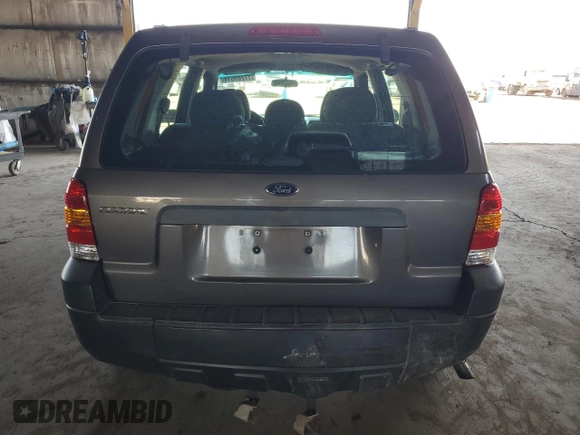 2006 Ford Escape XLS with VIN 1FMYU02ZX6KC49160, listed as a Copart auction lot 77269514 with 189,984 mi miles and Salvage Title. Bid and sale history available at carsss.com. Image 6.