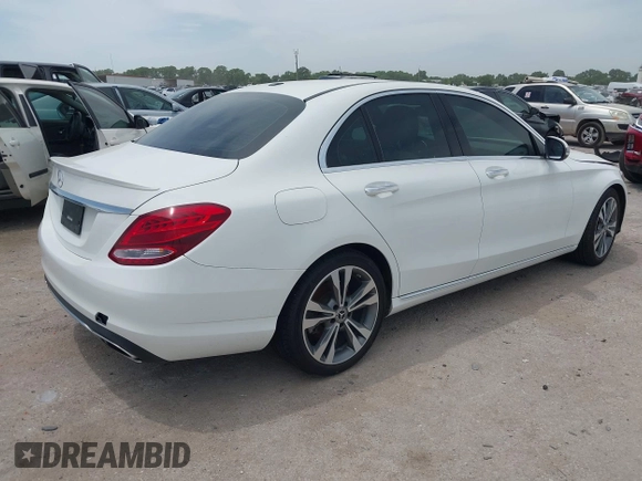2018 Mercedes-Benz C 300 with VIN 55SWF4JB3JU242931, listed as a IAAI auction lot 42267645 with 194,674 mi miles and . Bid and sale history available at DreamBid. Image 4.