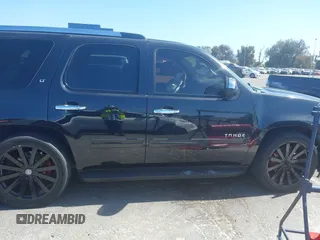 2013 Chevrolet Tahoe LT z VIN 1GNSCBE03DR174545, wystawiony jako IAAI lot #42510886 z przebiegiem 184 627 mil mil oraz . Historia ofert i sprzedaży dostępna na DreamBid. Obrazek 13.