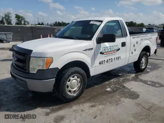2014 Ford F-150 XL with VIN 1FTMF1CM7EKF39988, listed as a Copart auction lot 51571215 with 129,199 mi miles and Salvage Title. Bid and sale history available at carsss.com. Image 1.