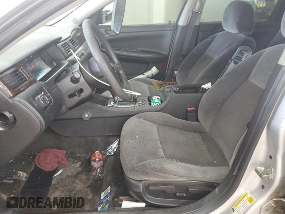 2012 Chevrolet Impala LS Fleet with VIN 2G1WF5E39C1117019, listed as a Copart auction lot 62472985 with 221,118 mi miles and Salvage title. Bid and sale history available at DreamBid. Image 7.