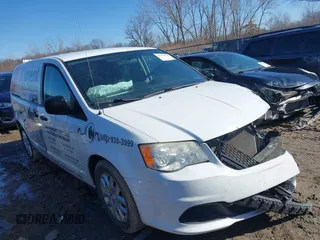 2014 Ram Cargo Van Tradesman with VIN 2C4JRGAGXER372764, listed as a IAAI auction lot 41753733 with 160,689 mi miles. Bid and sale history available at carsss.com. Image 1.